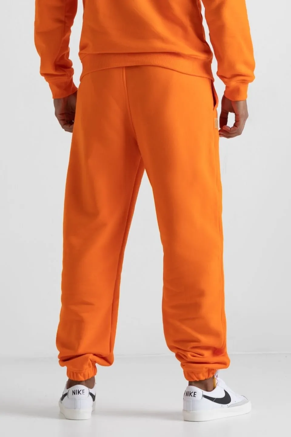 Spodnie dresowe mskie JOGGERY - ORANGE