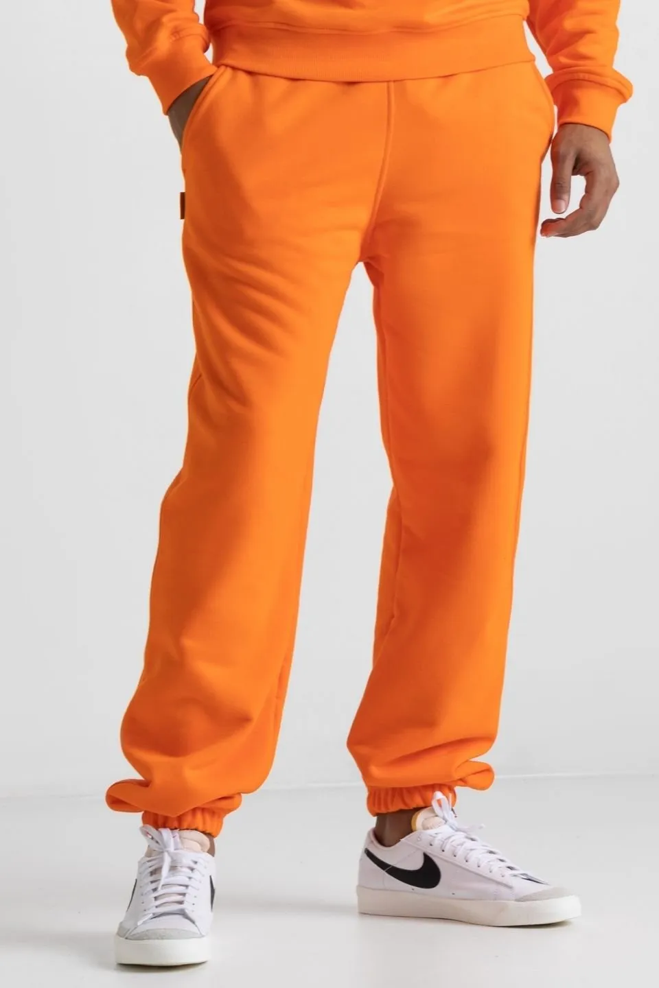 Spodnie dresowe mskie JOGGERY - ORANGE